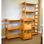 Modern yellow pine five shelf open wall unit, together with a similar three shelf example and a