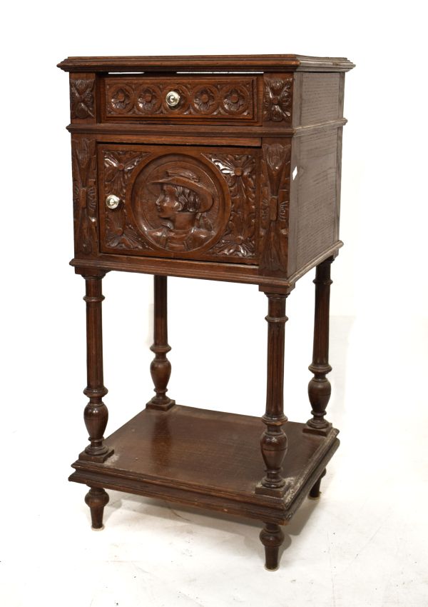 French carved oak pot cupboard, the moulded square top over carved frieze drawer and cupboard with