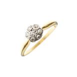 18ct gold diamond set daisy cluster ring, size N, 2.1g approx gross Condition: