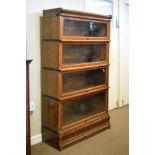 Early 20th Century four section Globe Wernicke modular stacking bookcase with cornice and plinth