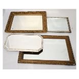 Late 19th/early 20th Century giltwood wall mirror having a plain rectangular plate within moulded
