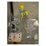 Five Babycham glasses, similar figure and beer mats Condition: