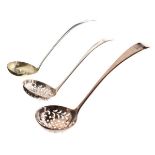 Two George III silver sifting ladles, together with a similar George IV ladle, London 1792, 1811 and