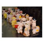 Set of Piggies ceramic figures, together with a wall shelf Condition: