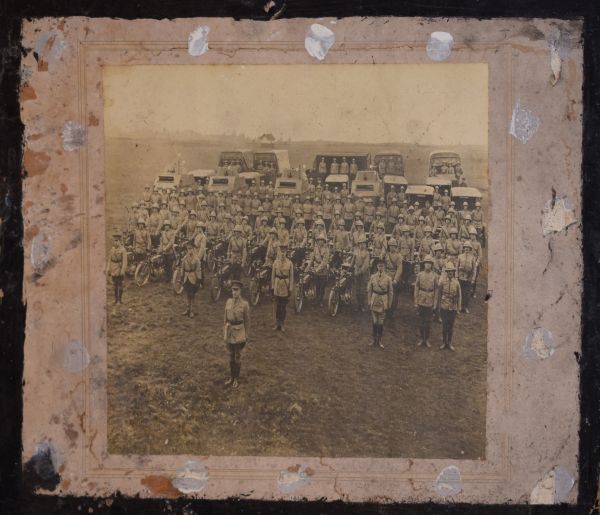 Military Interest - World War I era monochrome photograph depicting soldiers and vehicles on a