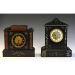 Two late 19th Century French black slate mantel clocks, each with single train timepiece movement
