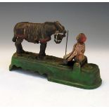 Cast iron mechanical money box of a bucking mule Condition: