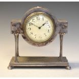 Early 20th Century silver plated mantel clock raised on four slender naturalistic pillars on a