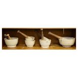 Group of five marble mortars, together with six pestles Condition: