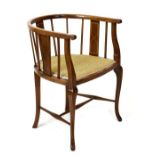 Early 20th Century tub back occasional chair having boxwood-strung vertical bars on fixed D shaped