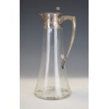 German 800 standard white metal mounted glass claret jug, the hinged cover with ball thumbpiece, the