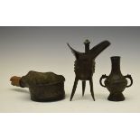 Chinese bronze silk iron, 14cm diameter, a bronze tripod, ritual wine vessel, 18cm high and a bronze