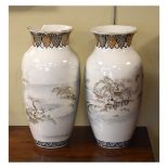 Pair of Japanese baluster shaped vases having hand painted winter landscape scenes, the base with