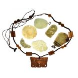 Collection of Oriental jade and hardstone pendants Condition: