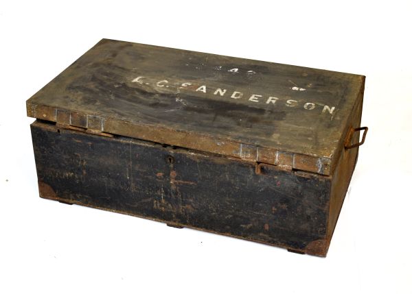 Early 20th Century metal trunk, the hinged cover painted 49442 A.C. Sanderson, between carry handles