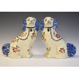 Pair of Siltone pottery hand painted comforter spaniels with flat back, stamped to base, 29cm high