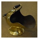 Victorian brass coal scuttle of helmet form with two ebonised turned carry handles Condition: