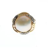 Dress ring set hemispherical pearl within a diamond border, the shank stamped 14k, size M Condition: