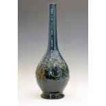 Elton Ware slender baluster shaped vase, typically decorated with stylised foliage on a blue,
