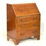 Early 20th Century inlaid mahogany bureau, the satinwood crossbanded top and fall enclosing