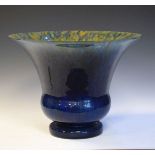 Large Monart type blue glass bowl, the interior with yellow, green and orange flecked decoration,