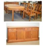 Late 20th Century Oriental hardwood dining suite comprising: circular extending dining table