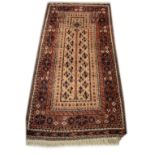 20th Century prayer rug with central tree motif within a mihrab (niche) and multi border, approx