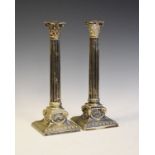 Pair of late 19th/early 20th Century silver plated Corinthian fluted column candlesticks on square