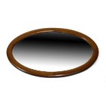 Edwardian mahogany and string inlaid oval framed wall mirror, 62cm x 37cm Condition: