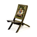 20th Century Indian painted folding occasional chair, the back depicting a couple seated upon a