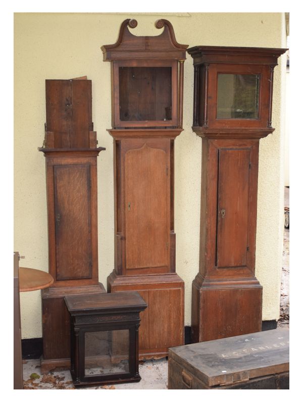 Group of late 18th/early 19th Century clock case parts comprising: mahogany crossbanded oak trunk