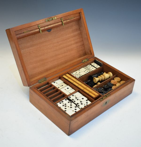 Victorian walnut cased games compendium containing two sizes of dominoes, cribbage marker board,