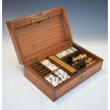 Victorian walnut cased games compendium containing two sizes of dominoes, cribbage marker board,