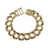 Textured flattened curb link bracelet, the links stamped 9k, 74.4g approx Condition: