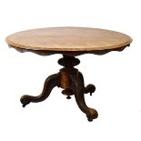 Early Victorian rosewood tilt top circular breakfast or centre table with moulded circular top and