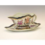 Samson porcelain sauceboat and stand decorated in the armorial Famille Rose style, each piece with