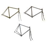 Steel racing frames - Pale green frame with chrome forks, a grey steel racing frame having tapered