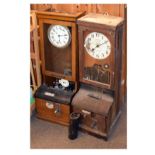 Two early 20th Century clocking-in clocks, the first by National Electric Time Recorder Co Ltd Kent,