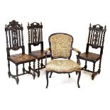 Three late 19th Century Flemish style carved oak dining chairs to include: a pair, a third with lion