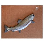 C.D. Nicholls ceramic relief plaque depicting a trout rising to a fly, the rounded body painted in