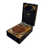 Early 20th Century turn table gramophone record player, the case gilt stamped to interior