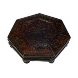 Chinese carved wooden octagonal box decorated with a phoenix amongst blossom Condition: