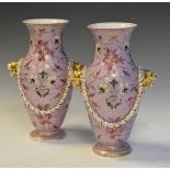 Pair of 19th Century French porcelain baluster shaped vases decorated with stylised foliage on a