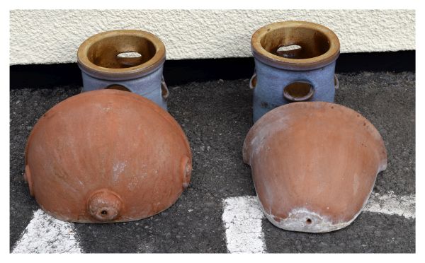 Pair of blue glazed pottery strawberry planters of cylindrical form with side holes, together with