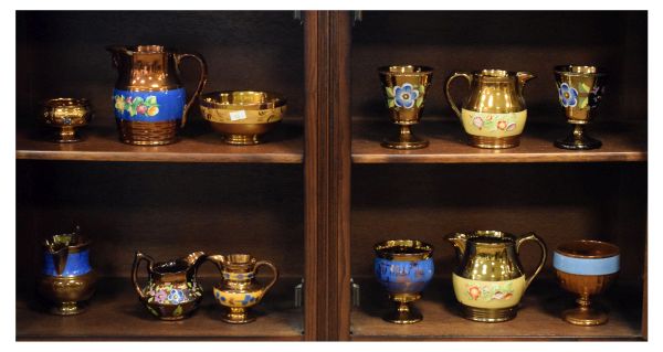 Selection of Victorian copper lustre pottery to include; jugs, bowls, goblets etc Condition: