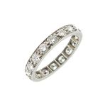 Unmarked white metal diamond set full eternity ring, size K, 2.7g approx Condition: