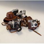 Four assorted cameras comprising: Praktina FX with F2 Jana Biotar lens, Exakta Varex II B with