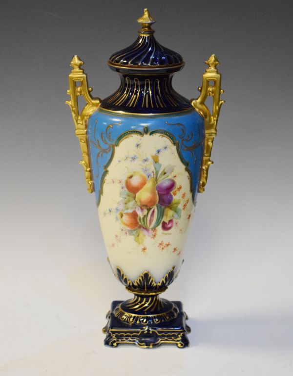 Late 19th Century Rudolstadt porcelain urn shaped two handled vase and cover having painted