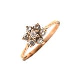 9ct gold seven stone diamond set daisy cluster ring, size O, 1.6g approx Condition:
