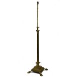 Early 20th Century brass adjustable standard lamp of Corinthian column design on stepped square base